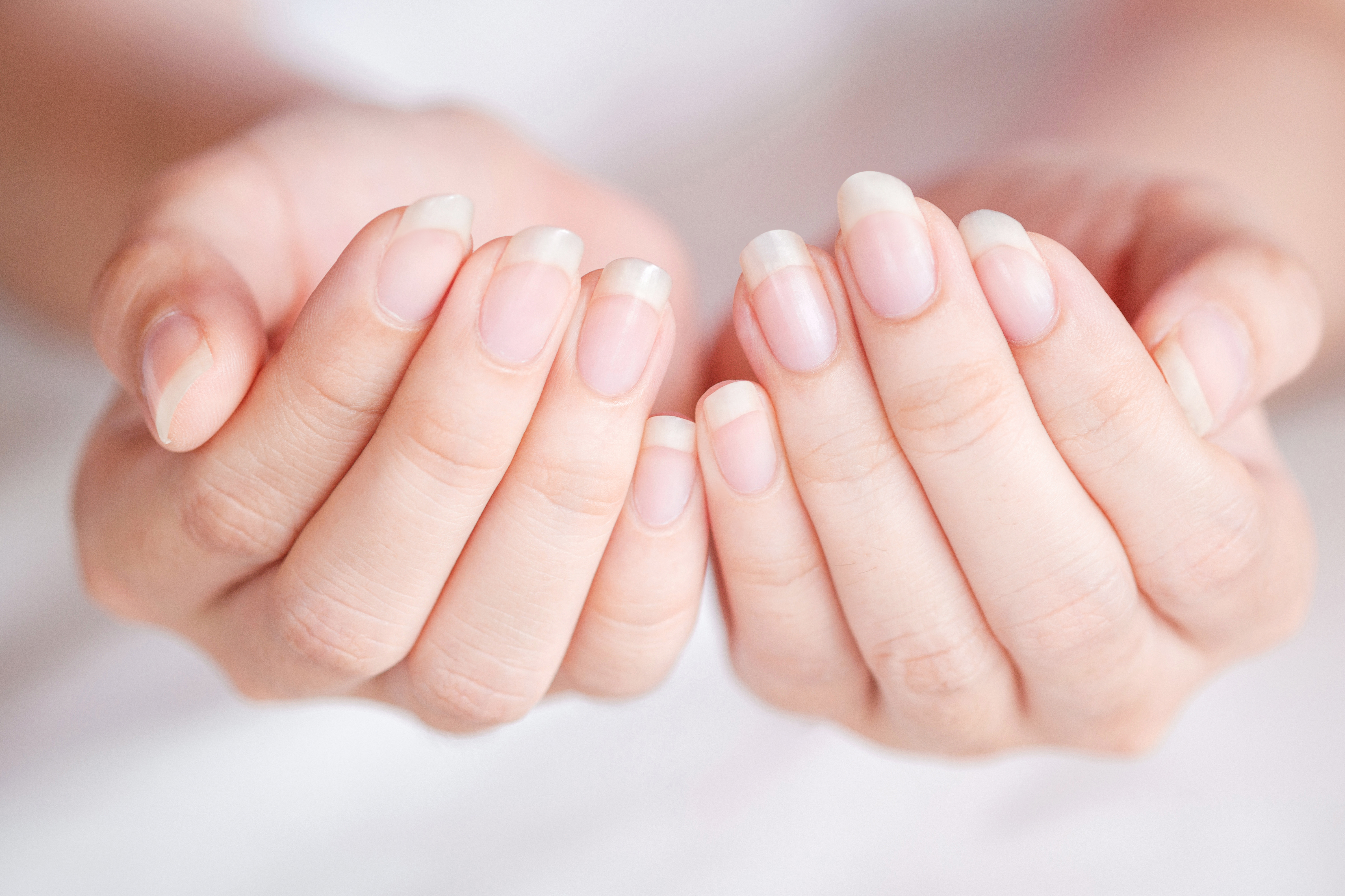 Close-Up long fingernail of women on background blurred, Concept of health care of the fingernail.